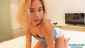 Horny Asian with small cleavage and white jeans ass