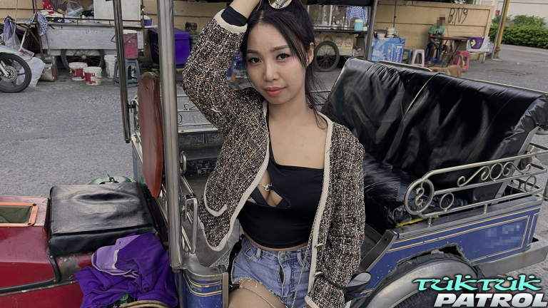 Big titted Akita Thai posing at back of Tuk Tuk