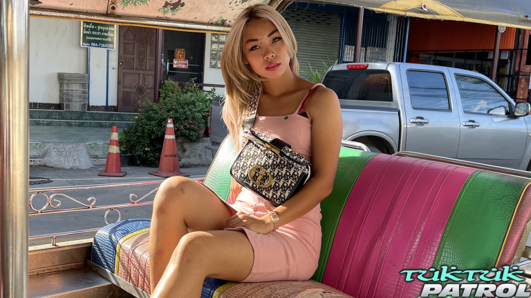 Sexy Petite Asian sitting in Tuk Tuk