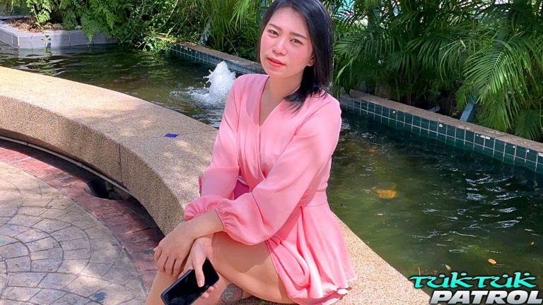 Average but pretty Asian MILF sitting outside