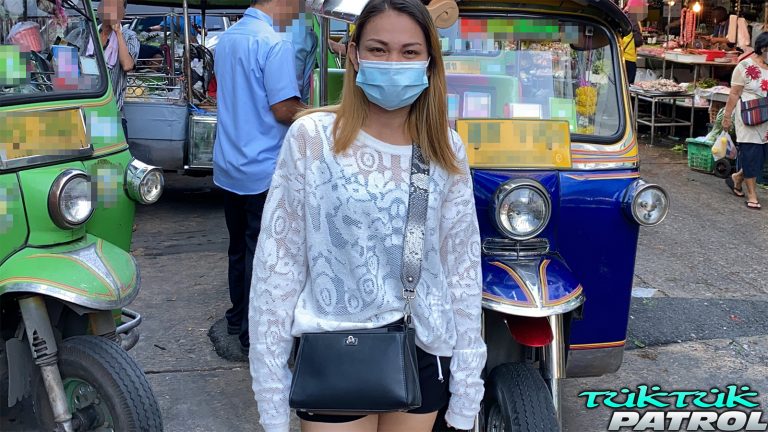 Asian Cougar in Bangkok street wearing face mask