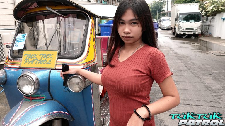 Big tits Asian teen standing outside next to Tuk Tuk