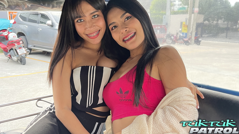 Two Thais in back seat of Tuk Tuk