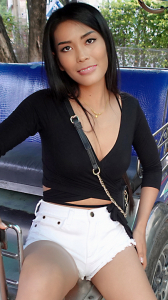 Elegant Thai girl TukTuk Patrol Party B shows sexy pose at tuk tuk