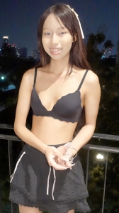 Seductive Thai hotty TukTuk Patrol Aommy poses in bra on balcony