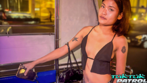 Adorable Thai babe wearing skimpy suggestive top