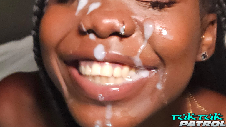 Big smile with cum all over her face